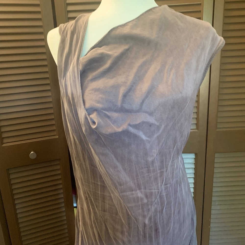 Distressed asymmetrical tank